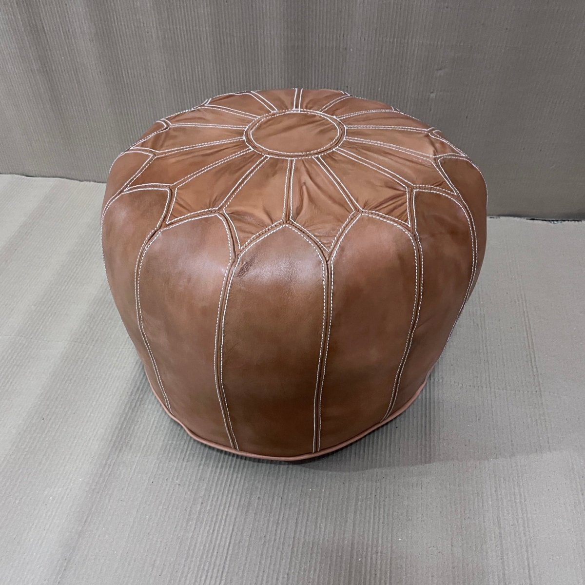 Round tan store ottoman