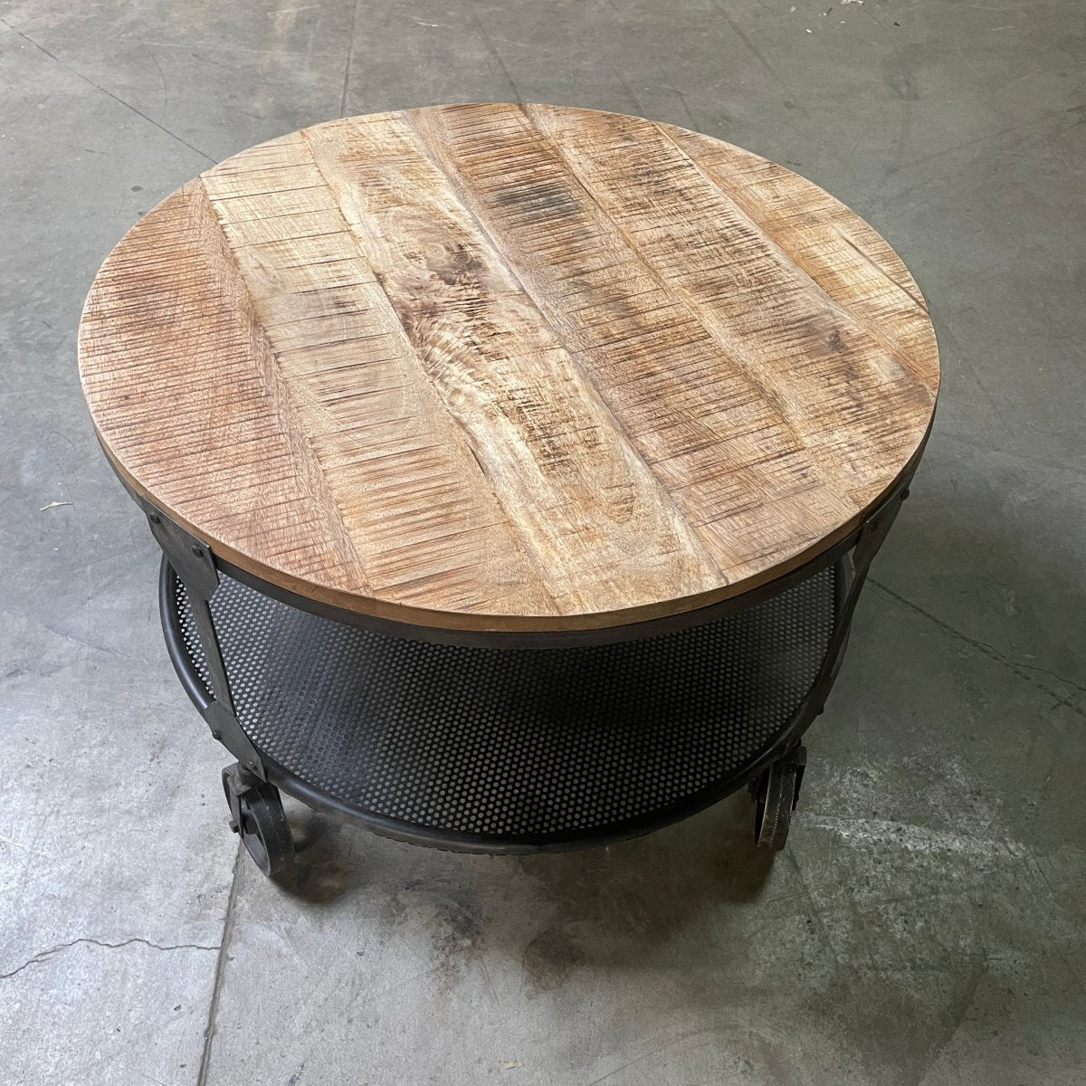 Crenay Round Mango Wood Coffee Table on wheels - Rustic Furniture Outlet